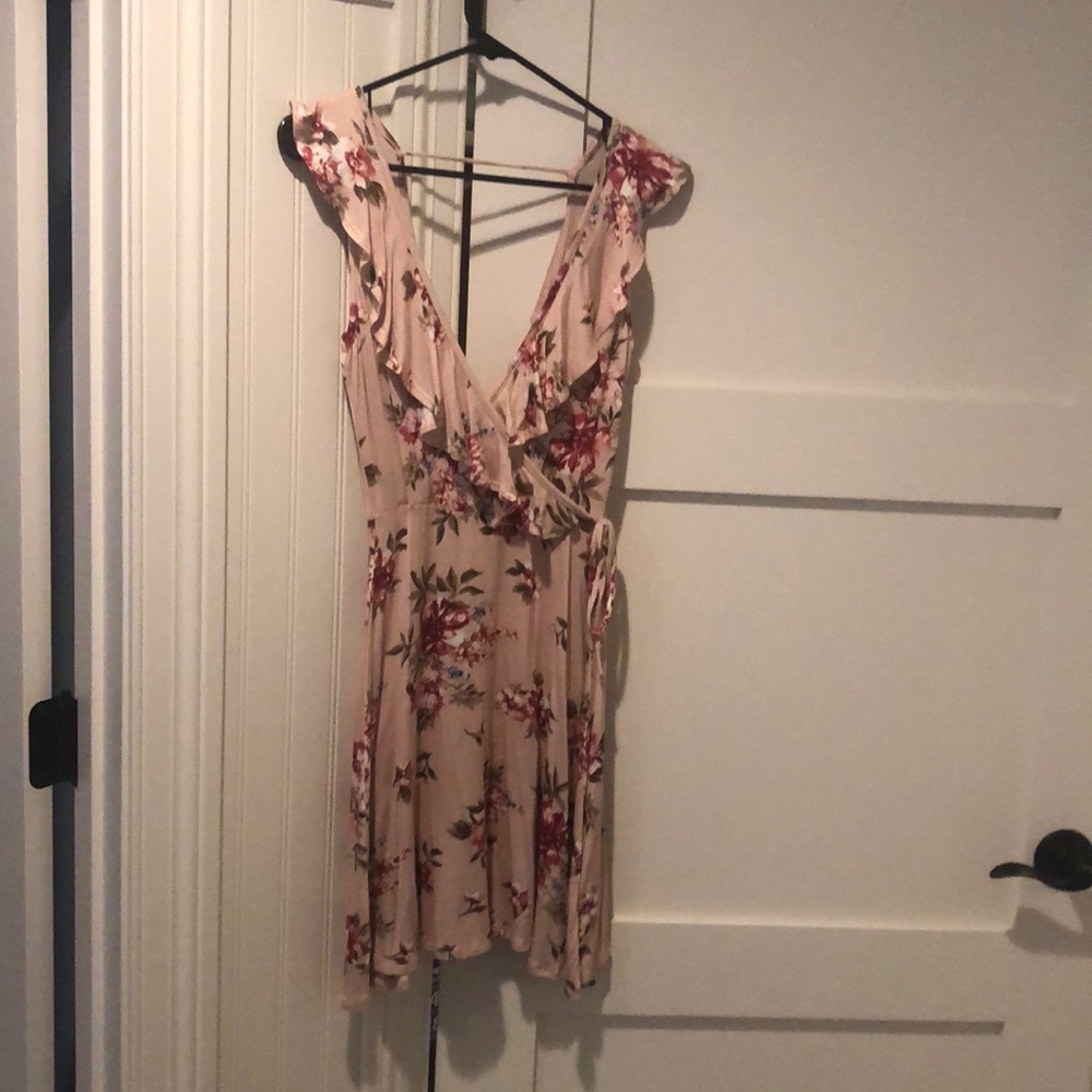 Light pink floral dress with ruffle detail